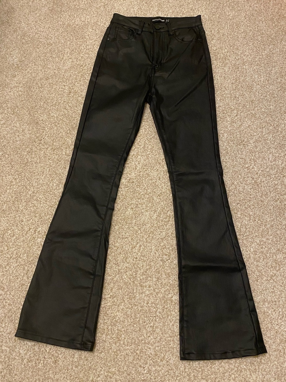 Black leather coated pants